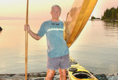 Learning the old way to roll a kayak